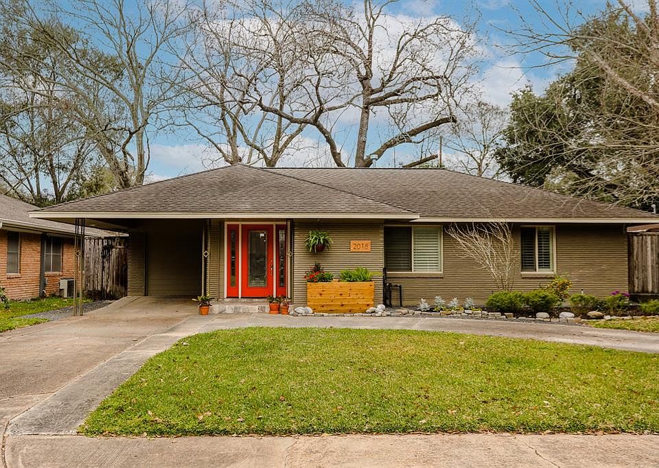 Welcome to 2018 Lamonte in Oak Forest! The home has 1 carport and a circle driveway, which is great for parking additional cars.