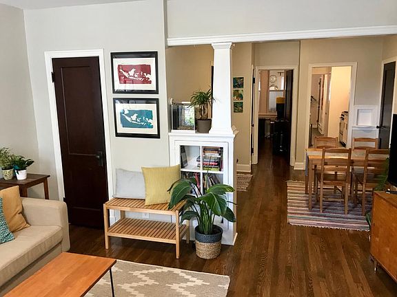 livingroom view to dining and kitchen