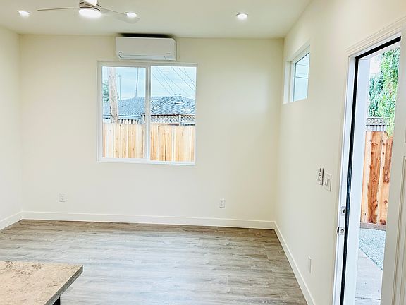 Living area with entrance door open