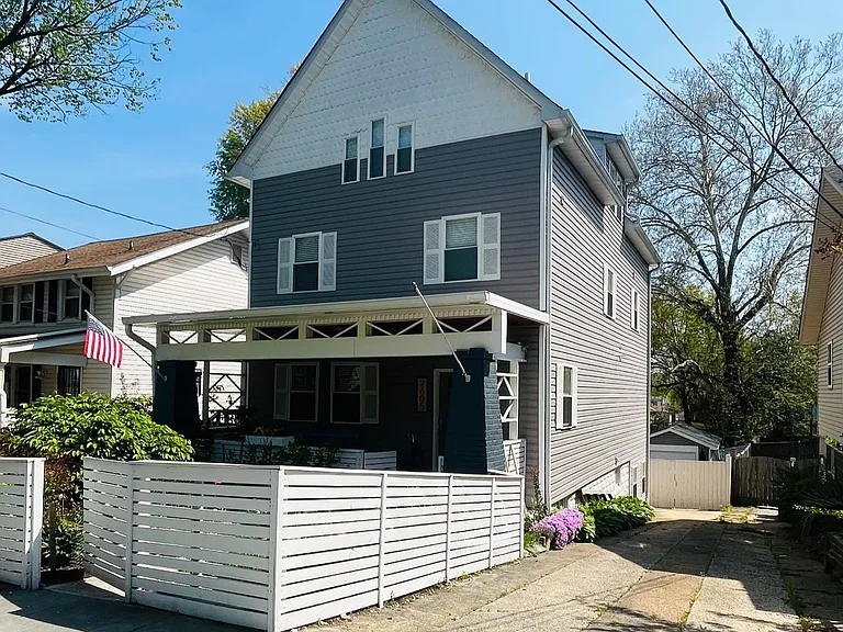Front of the house and entry way/ driveway into the basement APT