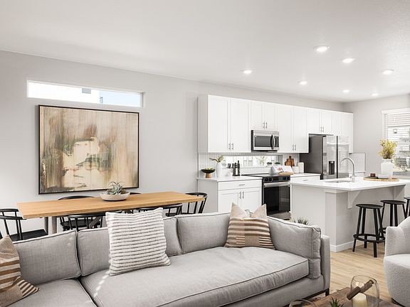 Desirable modern features like open-concept layouts, high-end finishes, and attached garages at The Fillmore.