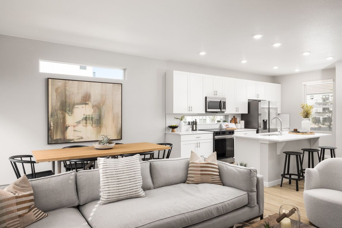 Desirable modern features like open-concept layouts, high-end finishes, and attached garages at The Fillmore.