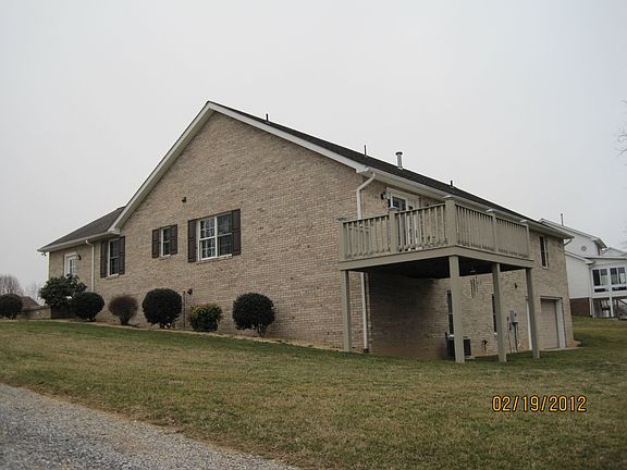 Mature rose bushes and landscaping