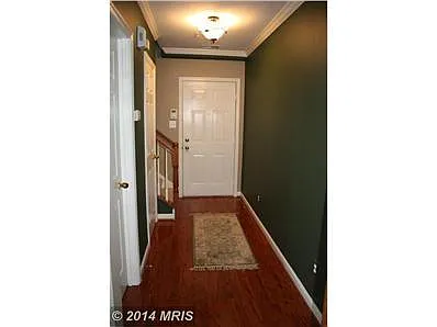 Foyer with runner - 13386 Spofford Rd #303