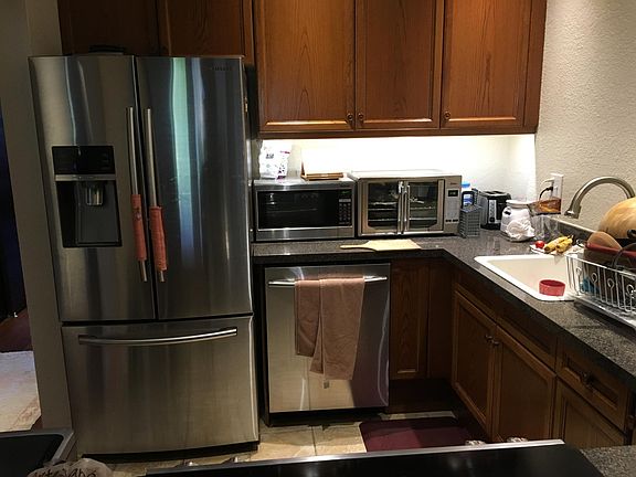 Samsung fridge, Dishwasher, microwave and toaster oven