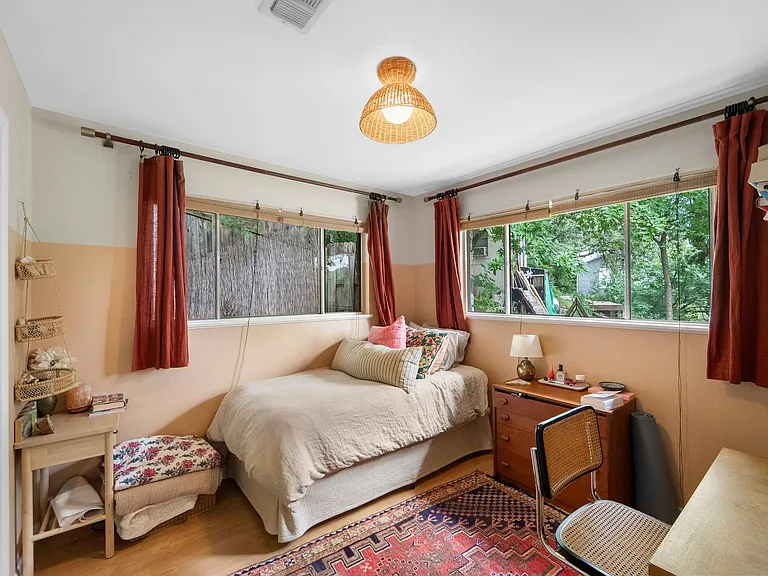 Third bedroom, just off first living and entry. Often used as an office as well.