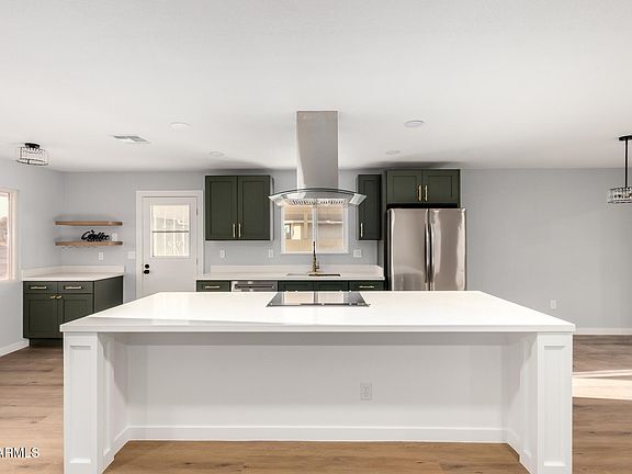 3rd image of 10210 W CHARTER OAK Drive