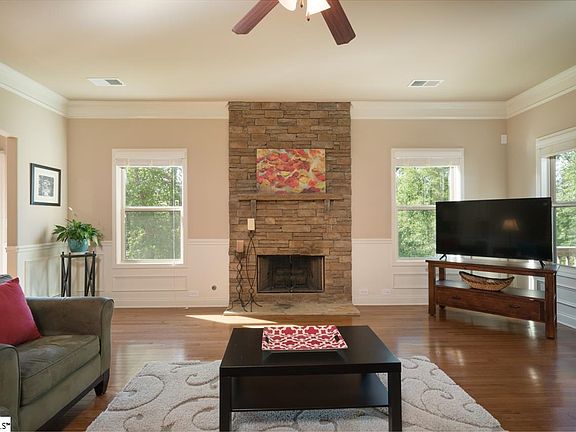 Great Room with fireplace that has a gas start but is also wood burning!