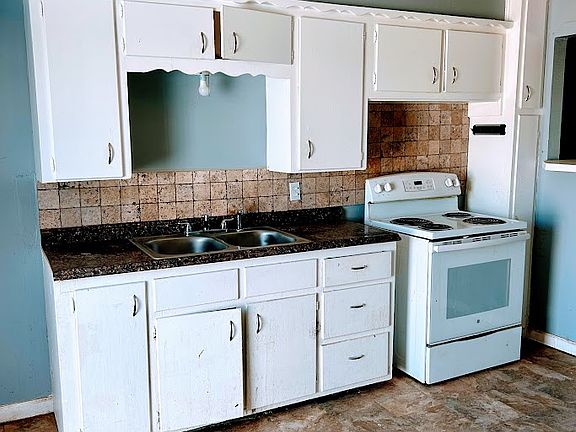 Large kitchen and eating area.