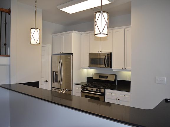 Raised bar top with room for bar stools.