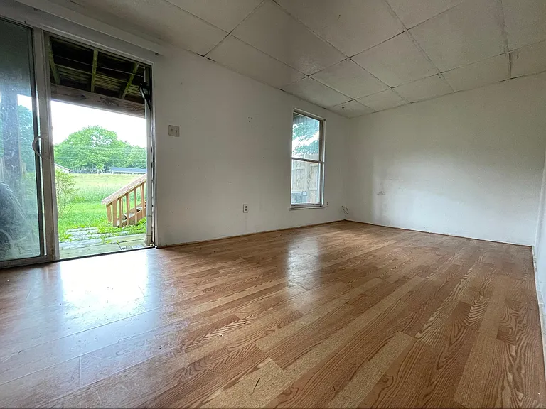 Basement family room (picture taken before the backyard was fenced)