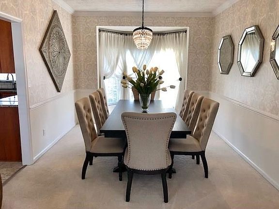 Formal Dining Room with Bowed Window for touch of Elegance.