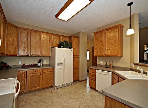 Plenty of cabinets compliment this kitchen.