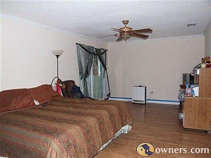 approx 20x25 master bedroom with access to patio