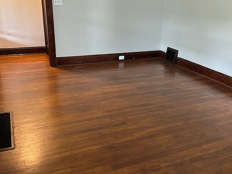 Living room with refinished original wooden floors