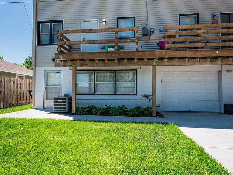 Rear of Dwelling. New deck coming in 2026!
Newly poured driveway, leading to single-car, private-entry garage
