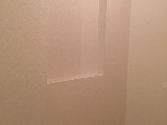 Wall facing entry