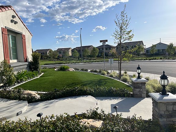 A beautiful walking park is right across the street.