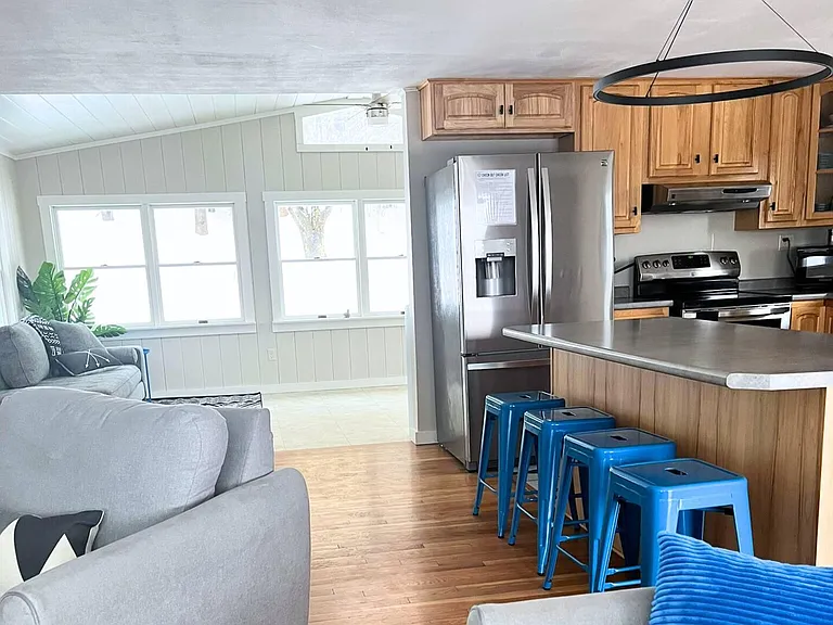 Large open-concept kitchen, dining and living area.