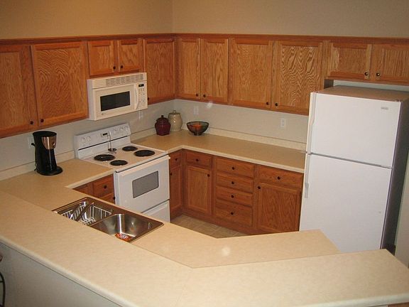 Great floor plan for entertaining. The kitchen breakfast bar has room for several seats.