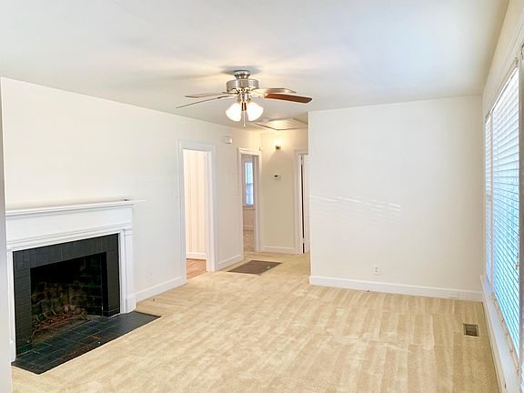 Living Room with Wood Burning Fireplace