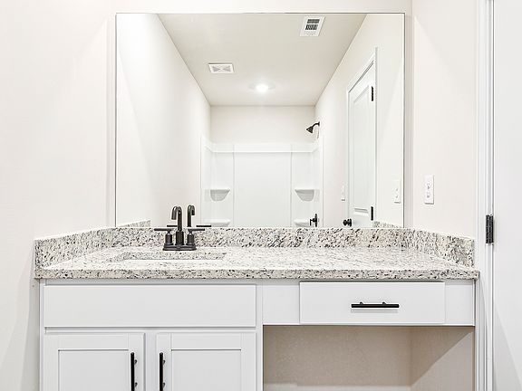 Get ready for your day in the master bathroom