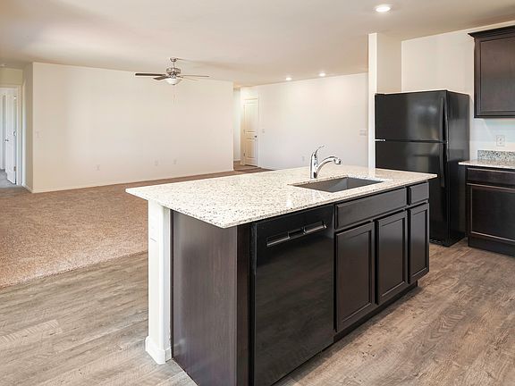 Open-concept layout with a great view from the kitchen to the living room.