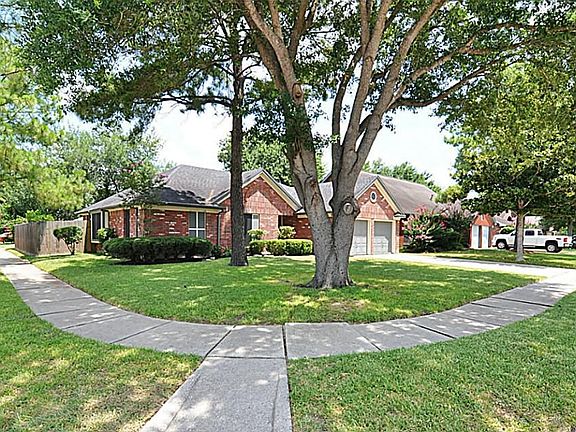All brick home on a corner lot.