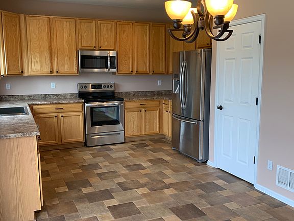 pantry next to fridge