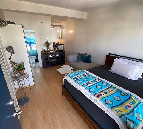 Main room with current tenants furniture.