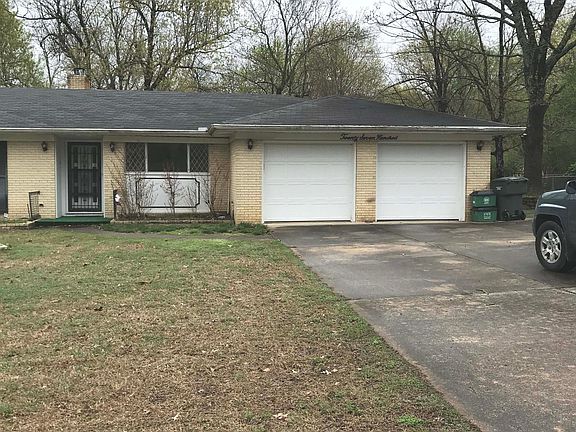 Front Entrance to house off of Loxley Ave, double garage has a door to kitchen/den area