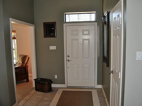 Inviting entryway with a Formal Dining to the left.