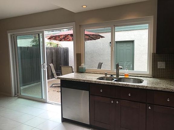 Kitchen leads to Large Courtyard/Patio