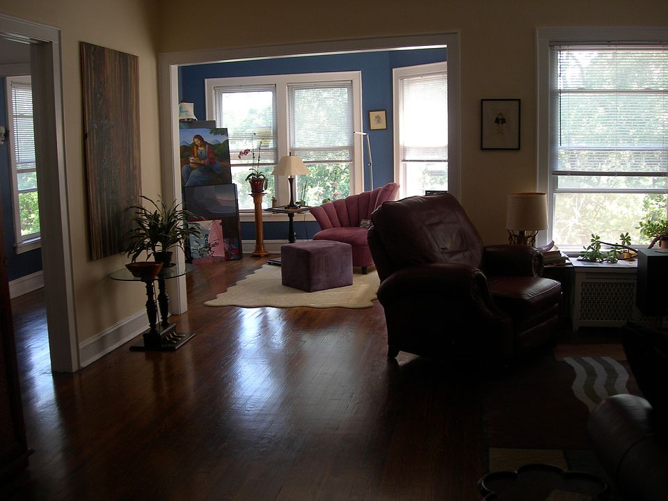 View of sunroom and living room from foyer