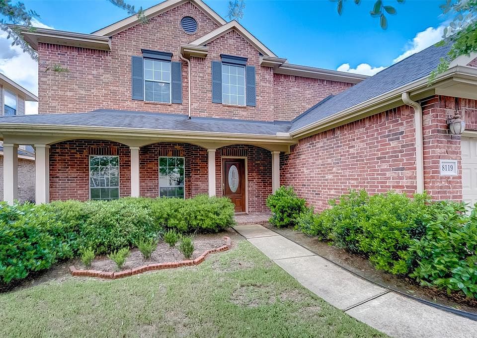 Lovely 2-story home on lake front lot in Terrace Brook. Front door faces north.