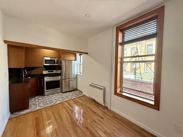 72-12 65th Pl #1 — Photo 1