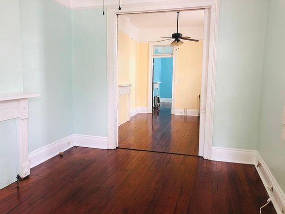 View from front door into living room & kitchen