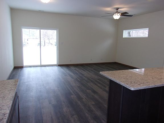 Living & Dinnng with Sliding Glass Doors to the Backyard