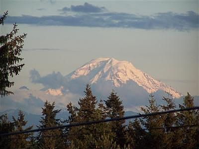 Mountain majesty! Great view from large deck the extends the living room of the home.
