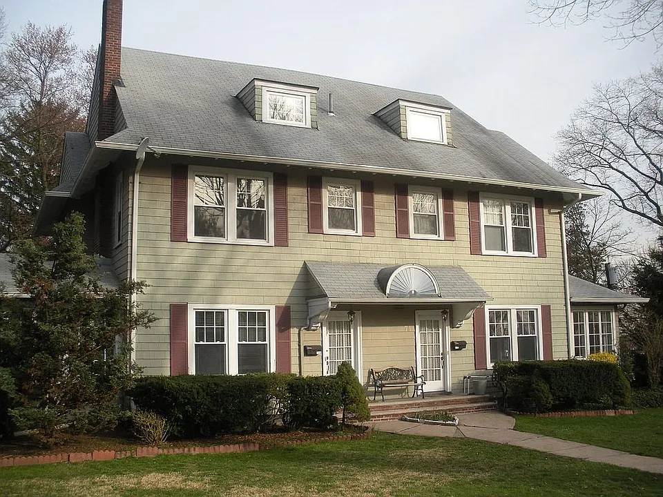 Stately Colonial Duplex