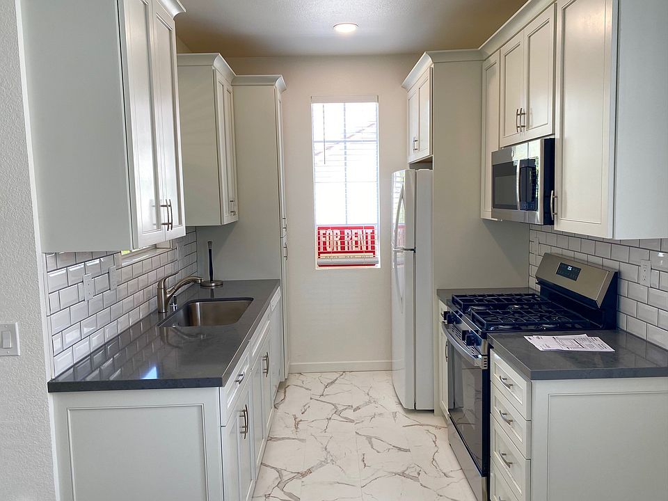 1st image of 10884 Sabre Hill Dr Unit 308