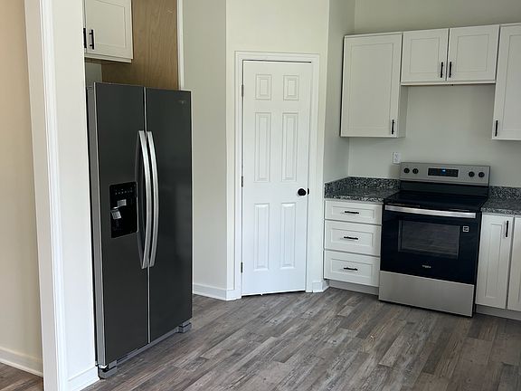 Kitchen showing Pantry and Appliances