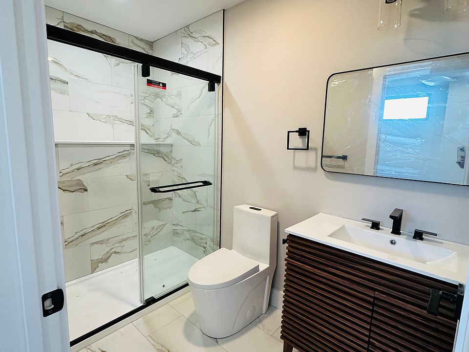 Beautiful tiled bathroom with In-Unit Laundry!
Layouts differ but finishes are exact. Photo may be from a different unit