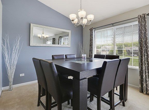 Pictures paint a thousand words; this breakfast/ dining area is plenty spacious to comfortably seat 