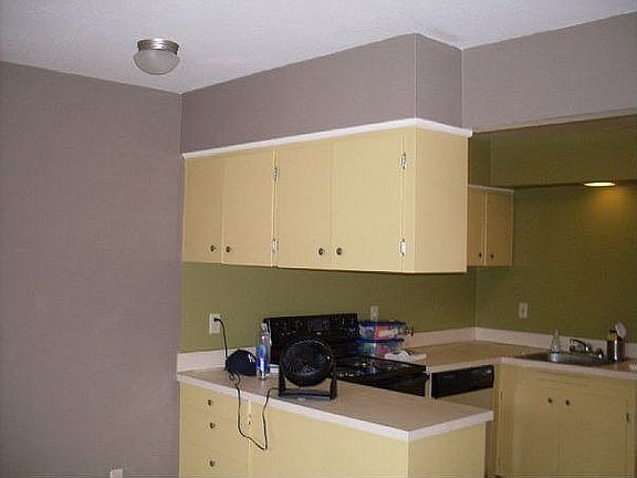 After, new carpet, paint, new resurfaced cabinets
