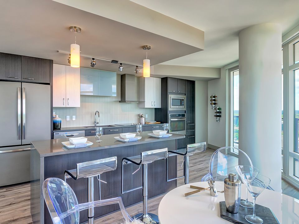Kitchen with island and stainless steel appliances