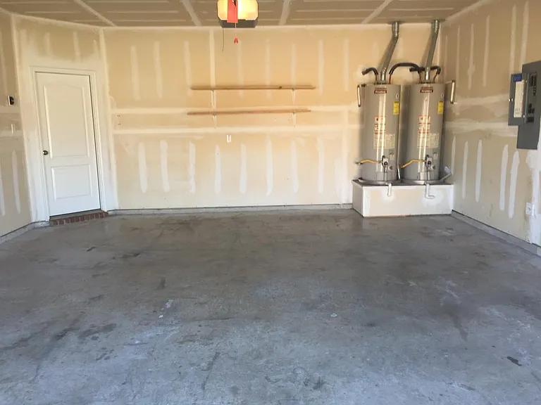 garage w/ double water heaters