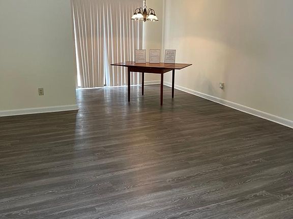 Large living and dinning room combination with half bath.