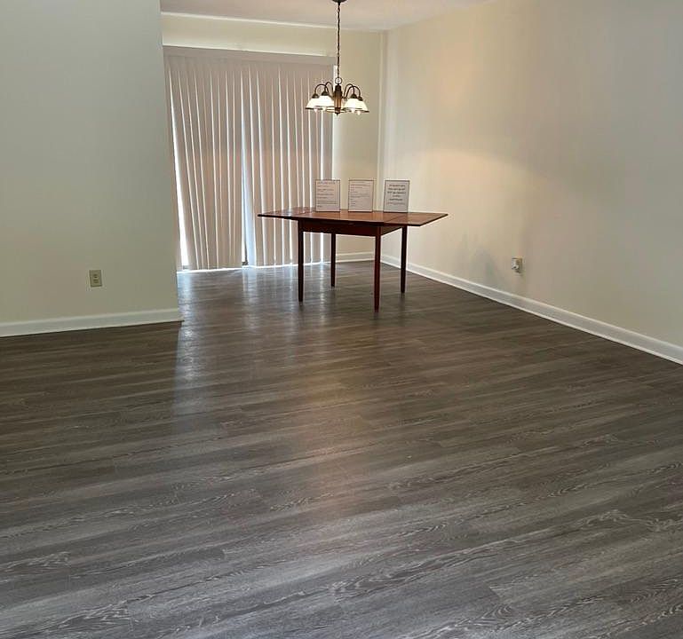 Large living and dinning room combination with half bath.