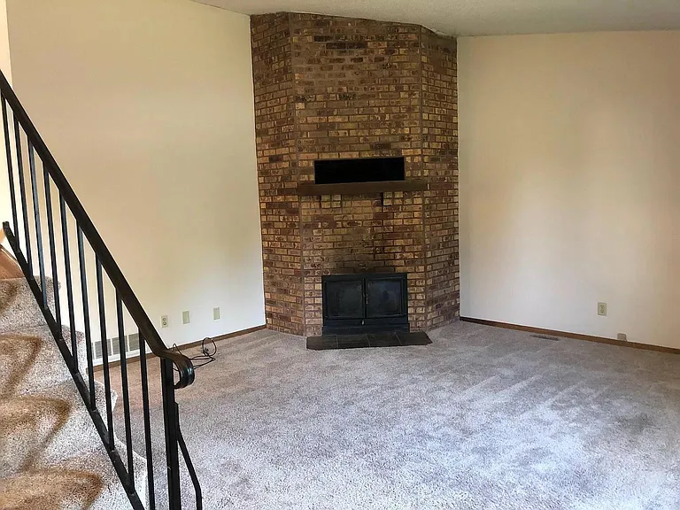Wood-burning fireplace in the living area.